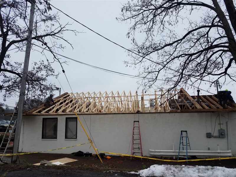 Wide view of a Wheeler commercial roof reconstruction in progress