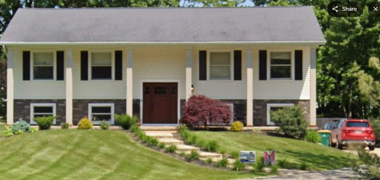 Finished siding work by Wheeler Construction